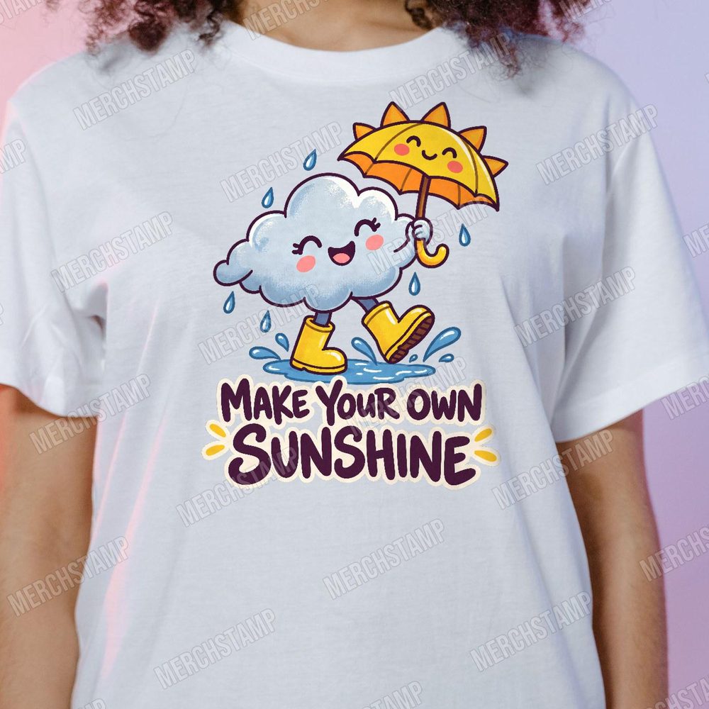 Make Your Own Sunshine PNG design shown on a white t-shirt, a smiling rain cloud in yellow boots holding a sun-shaped umbrella above the words Make Your Own Sunshine