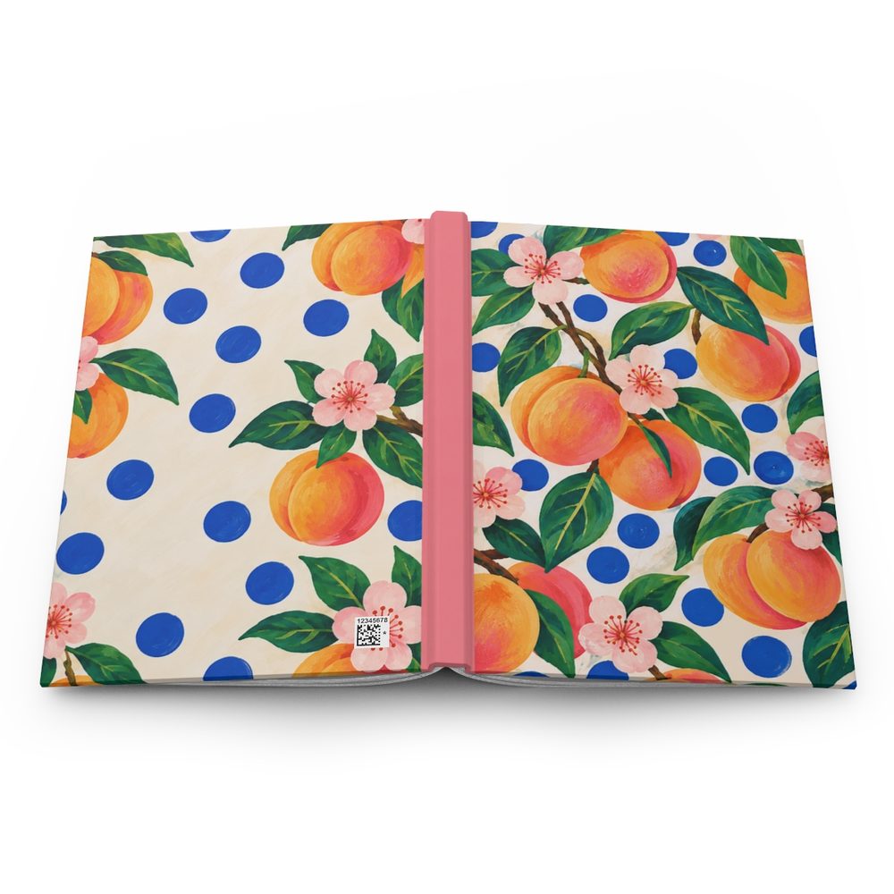 Apricot and Polka Dot hardcover journal shown open flat, bright apricots, green leaves and blossoms over cobalt polka dots wrapping across the front, spine and back cover