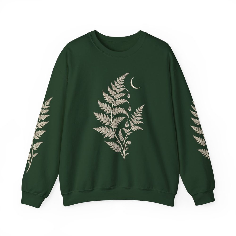 Fern and Crescent crewneck sweatshirt in forest green, a pale fern frond with raindrops and a small crescent moon on the front with matching prints down both sleeves