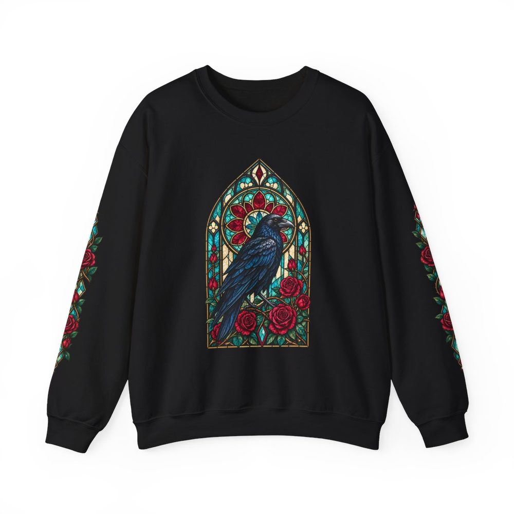 Raven Stained Glass crewneck sweatshirt in black, a raven inside a stained-glass arch framed by red roses on the front with matching prints down both sleeves