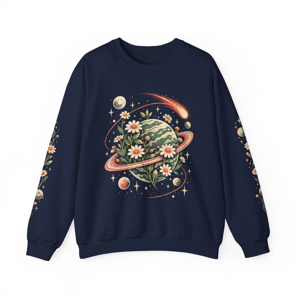 Retro Planet and Daisy crewneck sweatshirt in navy, a ringed green planet wreathed in daisies with a shooting star on the front with matching prints down both sleeves
