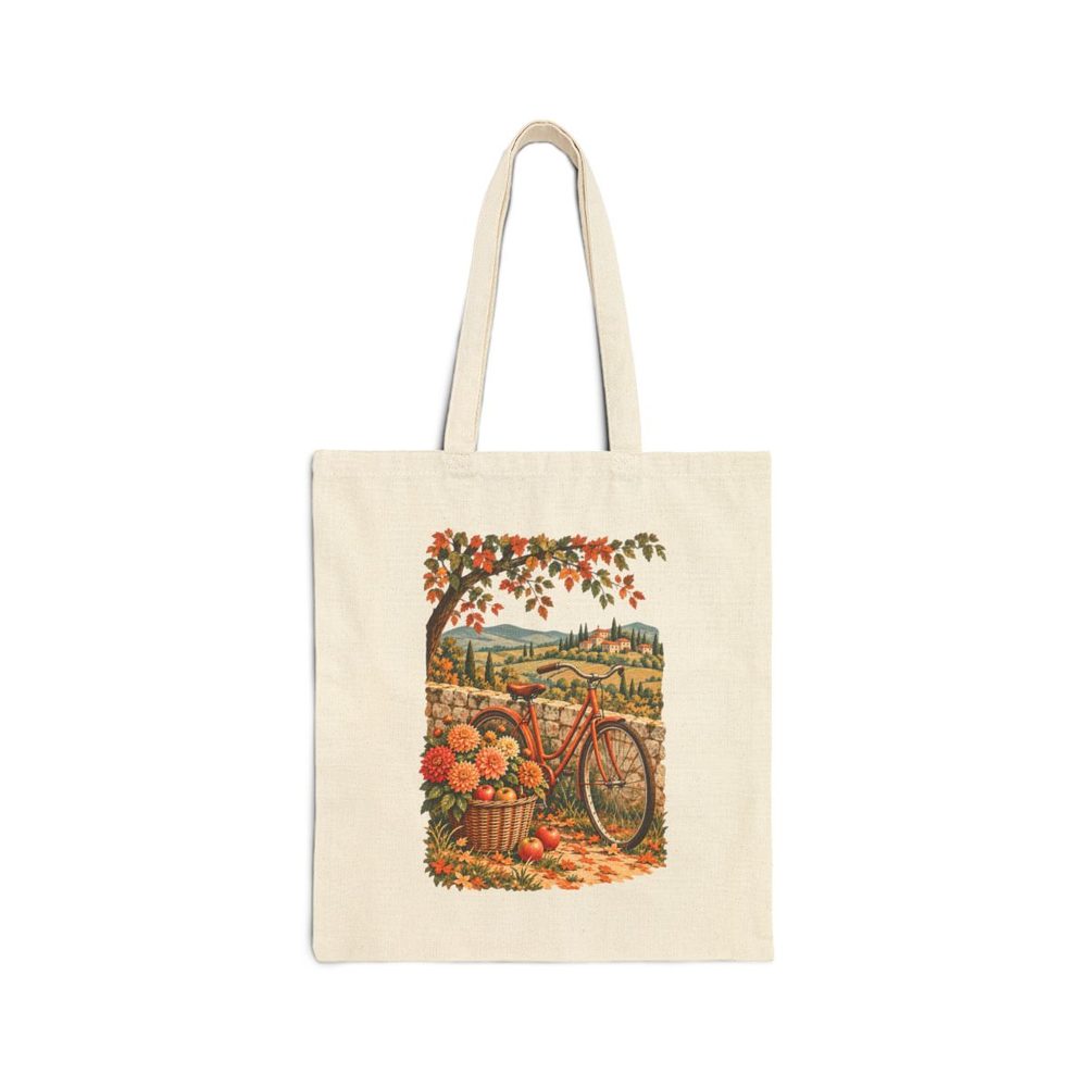 Vintage Bicycle and Flowers tote bag in natural cotton canvas, printed with a vintage bicycle with a basket of autumn flowers beneath a tree in fall color